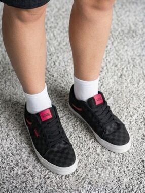 Vans Men’s Black Checkerboard Sneakers with Red Accents